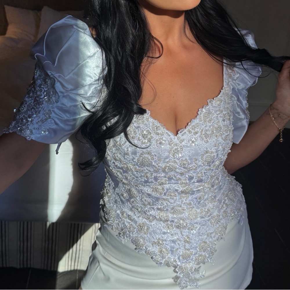 Elegant beaded white lace corset